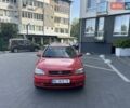 Красный Опель Астра, объемом двигателя 1.6 л и пробегом 250 тыс. км за 2550 $, фото 1 на Automoto.ua