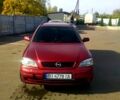 Красный Опель Астра, объемом двигателя 1.6 л и пробегом 375 тыс. км за 2100 $, фото 1 на Automoto.ua