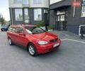 Красный Опель Астра, объемом двигателя 1.6 л и пробегом 250 тыс. км за 2550 $, фото 1 на Automoto.ua