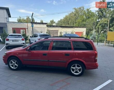 Красный Опель Астра, объемом двигателя 1.6 л и пробегом 250 тыс. км за 2550 $, фото 4 на Automoto.ua
