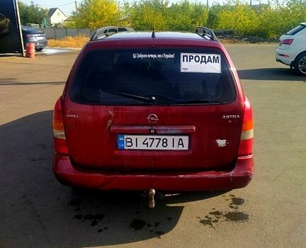 Красный Опель Астра, объемом двигателя 1.6 л и пробегом 375 тыс. км за 2100 $, фото 1 на Automoto.ua
