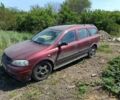 Красный Опель Астра, объемом двигателя 1.6 л и пробегом 255 тыс. км за 1450 $, фото 1 на Automoto.ua