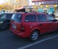 Красный Опель Астра, объемом двигателя 1.6 л и пробегом 250 тыс. км за 2600 $, фото 1 на Automoto.ua