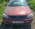 Красный Опель Астра, объемом двигателя 1.6 л и пробегом 255 тыс. км за 1450 $, фото 1 на Automoto.ua