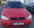 Красный Опель Астра, объемом двигателя 1.6 л и пробегом 250 тыс. км за 2600 $, фото 7 на Automoto.ua