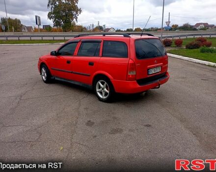 Красный Опель Астра, объемом двигателя 1.6 л и пробегом 300 тыс. км за 2550 $, фото 3 на Automoto.ua