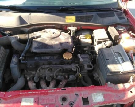 Червоний Опель Астра, об'ємом двигуна 1.6 л та пробігом 250 тис. км за 2600 $, фото 4 на Automoto.ua