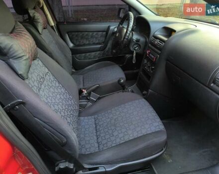Красный Опель Астра, объемом двигателя 1.6 л и пробегом 310 тыс. км за 3200 $, фото 30 на Automoto.ua