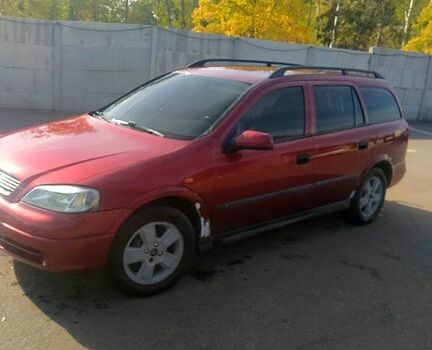 Красный Опель Астра, объемом двигателя 1.6 л и пробегом 375 тыс. км за 2100 $, фото 2 на Automoto.ua