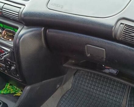 Красный Опель Астра, объемом двигателя 1.6 л и пробегом 400 тыс. км за 1800 $, фото 6 на Automoto.ua