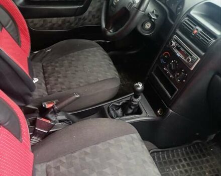 Червоний Опель Астра, об'ємом двигуна 1.6 л та пробігом 270 тис. км за 2800 $, фото 3 на Automoto.ua