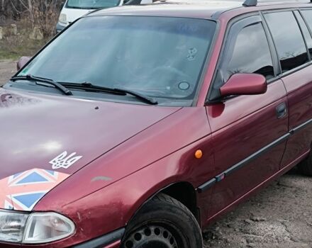 Красный Опель Астра, объемом двигателя 1.6 л и пробегом 400 тыс. км за 2000 $, фото 6 на Automoto.ua