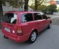 Красный Опель Астра, объемом двигателя 1.6 л и пробегом 310 тыс. км за 3200 $, фото 4 на Automoto.ua