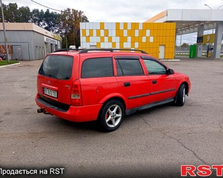 Красный Опель Астра, объемом двигателя 1.6 л и пробегом 300 тыс. км за 2550 $, фото 2 на Automoto.ua