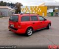 Красный Опель Астра, объемом двигателя 1.6 л и пробегом 300 тыс. км за 2550 $, фото 2 на Automoto.ua
