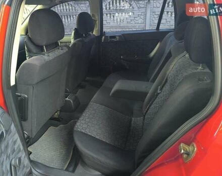 Красный Опель Астра, объемом двигателя 1.6 л и пробегом 310 тыс. км за 3200 $, фото 1 на Automoto.ua