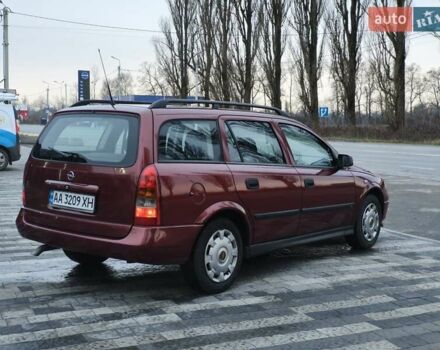 Красный Опель Астра, объемом двигателя 2 л и пробегом 281 тыс. км за 2999 $, фото 3 на Automoto.ua