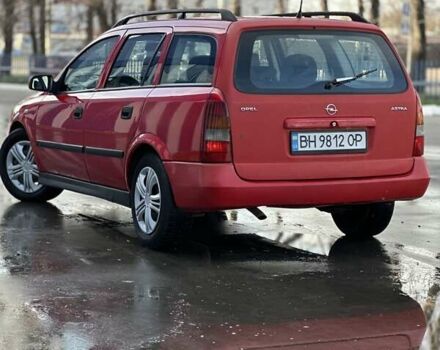 Красный Опель Астра, объемом двигателя 2 л и пробегом 250 тыс. км за 2699 $, фото 4 на Automoto.ua