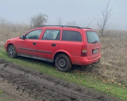 Красный Опель Астра, объемом двигателя 1.6 л и пробегом 234 тыс. км за 2500 $, фото 2 на Automoto.ua