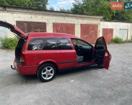 Червоний Опель Астра, об'ємом двигуна 2 л та пробігом 279 тис. км за 2799 $, фото 22 на Automoto.ua