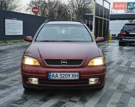 Красный Опель Астра, объемом двигателя 2 л и пробегом 281 тыс. км за 2999 $, фото 1 на Automoto.ua