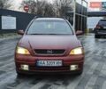 Красный Опель Астра, объемом двигателя 2 л и пробегом 281 тыс. км за 2999 $, фото 1 на Automoto.ua