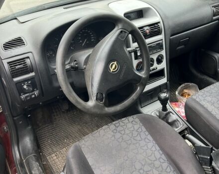 Опель Астра 1999 в Переяславе-Хмельницком на Automoto.ua Красный Опель Астра, объемом двигателя 2 л и пробегом 200 тыс. км за 750 $, фото 4 на Automoto.ua