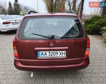 Красный Опель Астра, объемом двигателя 2 л и пробегом 281 тыс. км за 2999 $, фото 23 на Automoto.ua