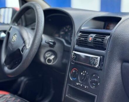 Красный Опель Астра, объемом двигателя 2 л и пробегом 250 тыс. км за 2699 $, фото 10 на Automoto.ua