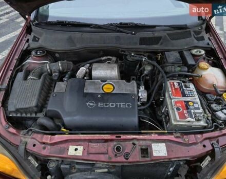 Красный Опель Астра, объемом двигателя 2 л и пробегом 281 тыс. км за 2999 $, фото 6 на Automoto.ua