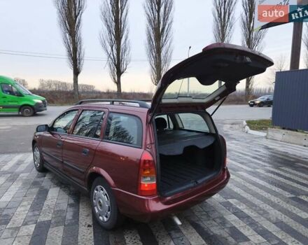Красный Опель Астра, объемом двигателя 2 л и пробегом 281 тыс. км за 2999 $, фото 5 на Automoto.ua