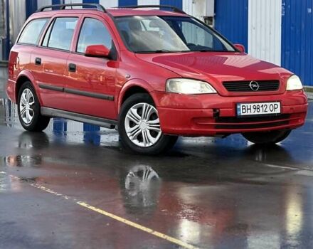 Красный Опель Астра, объемом двигателя 2 л и пробегом 250 тыс. км за 2699 $, фото 1 на Automoto.ua