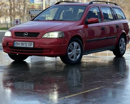 Красный Опель Астра, объемом двигателя 2 л и пробегом 250 тыс. км за 2699 $, фото 2 на Automoto.ua