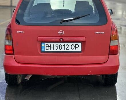 Красный Опель Астра, объемом двигателя 2 л и пробегом 250 тыс. км за 2699 $, фото 5 на Automoto.ua