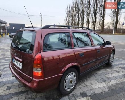 Красный Опель Астра, объемом двигателя 2 л и пробегом 281 тыс. км за 2999 $, фото 12 на Automoto.ua