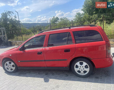 Красный Опель Астра, объемом двигателя 2 л и пробегом 300 тыс. км за 2700 $, фото 9 на Automoto.ua