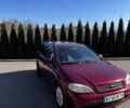Червоний Опель Астра, об'ємом двигуна 1.6 л та пробігом 248 тис. км за 3850 $, фото 1 на Automoto.ua
