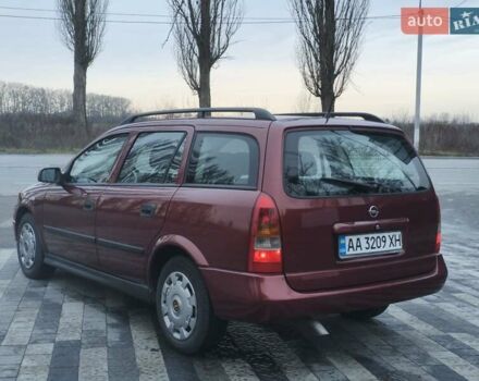 Красный Опель Астра, объемом двигателя 2 л и пробегом 281 тыс. км за 2999 $, фото 4 на Automoto.ua