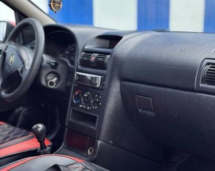 Красный Опель Астра, объемом двигателя 2 л и пробегом 250 тыс. км за 2699 $, фото 8 на Automoto.ua