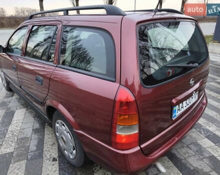 Красный Опель Астра, объемом двигателя 2 л и пробегом 281 тыс. км за 2999 $, фото 7 на Automoto.ua