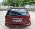 Красный Опель Астра, объемом двигателя 1.6 л и пробегом 180 тыс. км за 1744 $, фото 4 на Automoto.ua