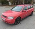 Красный Опель Астра, объемом двигателя 1.6 л и пробегом 295 тыс. км за 2700 $, фото 1 на Automoto.ua