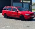 Красный Опель Астра, объемом двигателя 2 л и пробегом 280 тыс. км за 2608 $, фото 1 на Automoto.ua