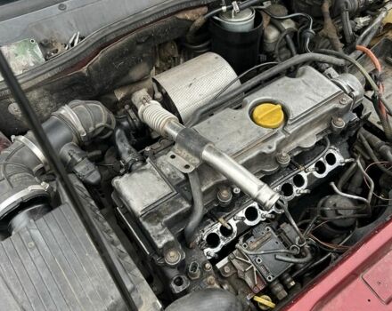 Красный Опель Астра, объемом двигателя 2 л и пробегом 80 тыс. км за 550 $, фото 5 на Automoto.ua