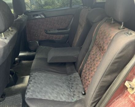 Червоний Опель Астра, об'ємом двигуна 1.6 л та пробігом 185 тис. км за 1450 $, фото 14 на Automoto.ua
