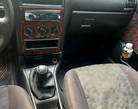 Червоний Опель Астра, об'ємом двигуна 1.6 л та пробігом 230 тис. км за 2100 $, фото 3 на Automoto.ua