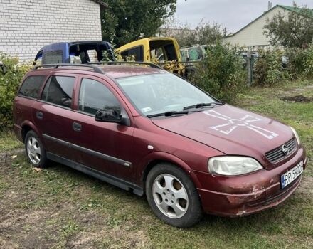 Красный Опель Астра, объемом двигателя 2 л и пробегом 200 тыс. км за 650 $, фото 1 на Automoto.ua