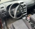 Красный Опель Астра, объемом двигателя 2 л и пробегом 80 тыс. км за 550 $, фото 4 на Automoto.ua
