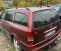 Красный Опель Астра, объемом двигателя 2 л и пробегом 80 тыс. км за 550 $, фото 2 на Automoto.ua