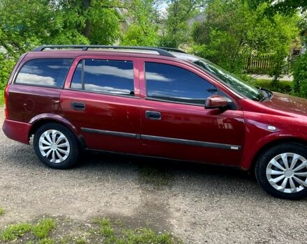 Червоний Опель Астра, об'ємом двигуна 1.6 л та пробігом 230 тис. км за 2100 $, фото 2 на Automoto.ua